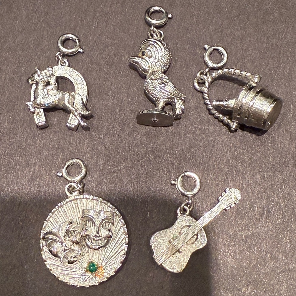 Set of 5 Monet silver bracelet charms. Bundled price